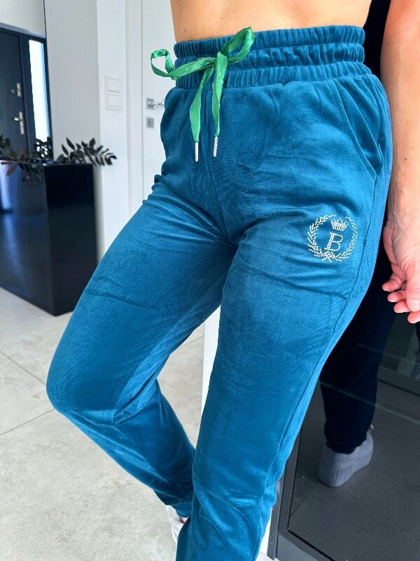 Damskie spodnie welurowe  z cekinami N696 morski